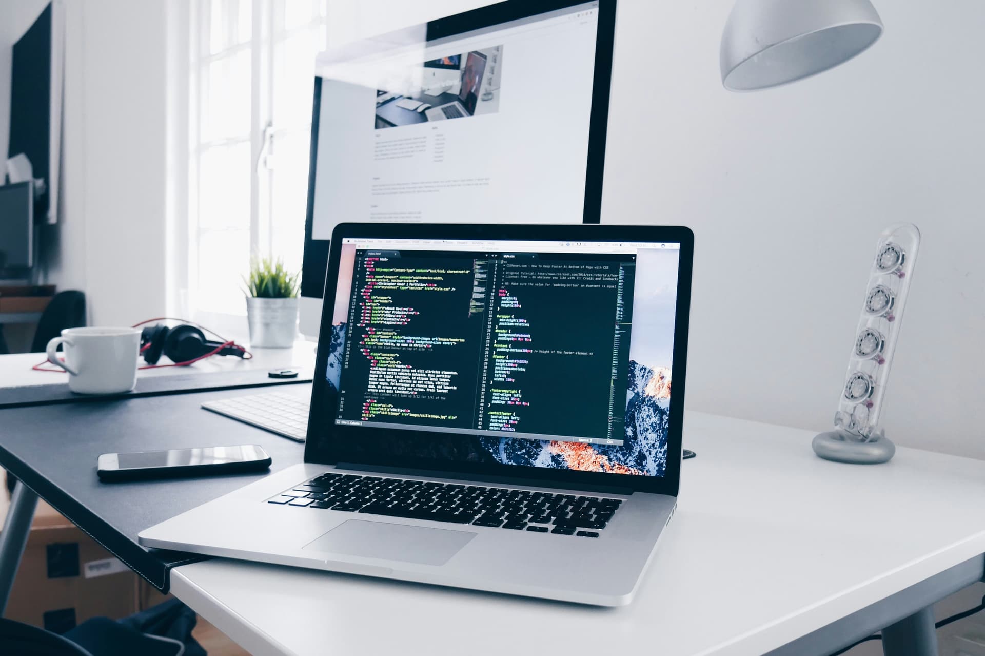 Source code open in an editor on a developer’s laptop
